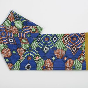 Toalla con estampado africano vibrante tejida a mano. Complementos con propósito y alma que trascienden modas.