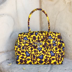 Bolso retro con estampado africano en marrón y amarillo. Hecho a mano. Apoya la moda consciente y solidaria.
