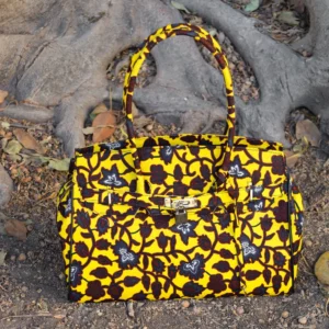 Bolso retro con estampado africano en marrón y amarillo. Hecho a mano. Apoya la moda consciente y solidaria.
