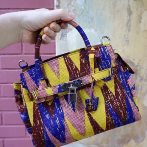 Bolso artesanal con estampado africano, hecho a mano. Descubre complementos étnicos de moda ética y exclusiva.